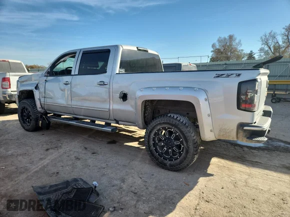 ✅ 2016 Chevrolet Silverado 1500 LT • VIN: 3GCUKREC6GG201071 • Лот: 90015585. Опубліковано раніше на Copart з пробігом 104 903 миль. Безкоштовний доступ до архіву аукціонних продажів зі США та докладний звіт про історію автомобіля на DreamBid. Зображення 2.