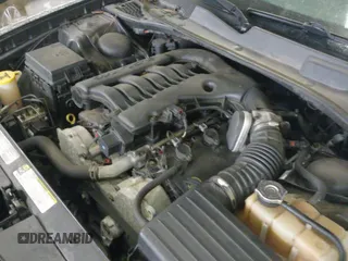 ✅ 2010 Dodge Charger • VIN: 2B3CA4CV8AH312994 • Lot: 43558591. Listed on IAAI with 156,424 mi. Free auction sales archive from the USA and detailed vehicle history report at DreamBid. Image 12.