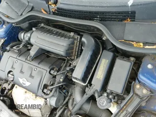 ✅ 2007 MINI Hardtop • VIN: WMWMF33557TT56832 • Lot: 42852312. Listed on IAAI with 102,696 mi. Free auction sales archive from the USA and detailed vehicle history report at DreamBid. Image 12.