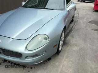 ✅ 2004 Maserati Coupe • VIN: ZAMBC38A240012148 • Lot: 66689845. Wystawiony na Copart z przebiegiem 87 977 mil. Bezpłatny archiwum sprzedaży aukcyjnych z USA i szczegółowy raport historii pojazdu na DreamBid. Zdjęcie 14.