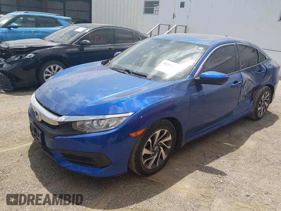 ✅ 2018 Honda Civic EX • VIN: 19XFC2F7XJE014823 • Lot: 45283441. Listed on IAAI with 127,852 mi. Free auction sales archive from the USA and detailed vehicle history report at DreamBid. Image 2.