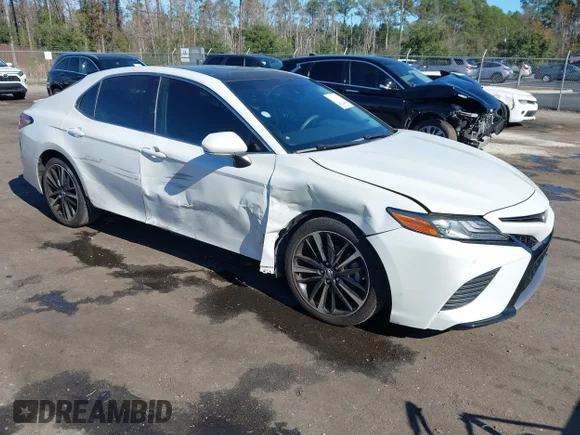 ✅ 2018 Toyota Camry XSE • VIN: 4T1B61HK9JU009286 • Lot: 43882794. Wystawiony na IAAI z przebiegiem 87 363 mil. Bezpłatny archiwum sprzedaży aukcyjnych z USA i szczegółowy raport historii pojazdu na DreamBid. Zdjęcie 1.