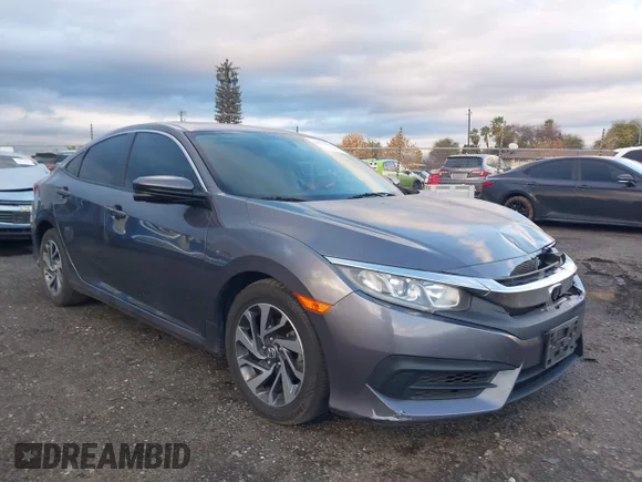 ✅ 2018 Honda Civic EX • VIN: 2HGFC2F77JH529591 • Lot: 44022369. Listed on IAAI with 125,435 mi. Free auction sales archive from the USA and detailed vehicle history report at DreamBid. Image 1.