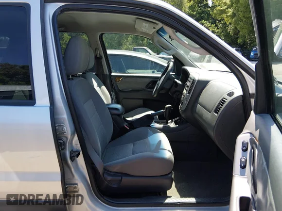 ✅ 2005 Ford Escape XLT • VIN: 1FMYU931X5KD62215 • Lot: 45407458. Listed on IAAI with 159,957 mi. Free auction sales archive from the USA and detailed vehicle history report at DreamBid. Image 5.