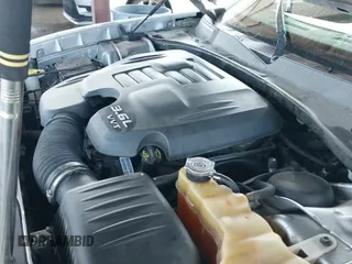 2013 Dodge Charger SXT z VIN 2C3CDXHG0DH725745, wystawiony jako IAAI lot #43466038 z przebiegiem 105 591 mil mil oraz . Historia ofert i sprzedaży dostępna na DreamBid. Obrazek 19.