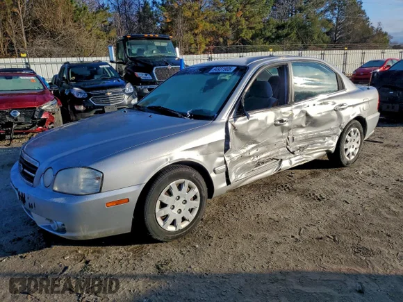 ✅ 2006 Kia Optima LX • VIN: KNAGD126165455992 • Lot: 94931905. Wystawiony na Copart z przebiegiem 147 800 mil. Bezpłatny archiwum sprzedaży aukcyjnych z USA i szczegółowy raport historii pojazdu na DreamBid. Zdjęcie 1.