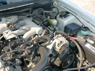 ✅ 2004 Ford Mustang Deluxe • VIN: 1FAFP44644F133509 • Lot: 42867807. Listed on IAAI with 100,717 mi. Free auction sales archive from the USA and detailed vehicle history report at DreamBid. Image 12.