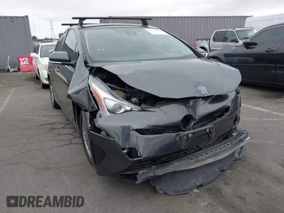 ✅ 2018 Toyota Prius Two • VIN: JTDKBRFU7J3063761 • Лот: 45111220. Опубліковано раніше на IAAI з пробігом 117 072 миль. Безкоштовний доступ до архіву аукціонних продажів зі США та докладний звіт про історію автомобіля на DreamBid. Зображення 1.