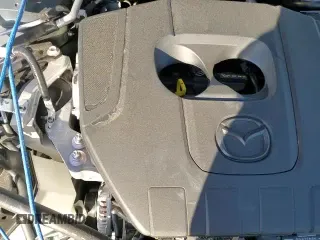 ✅ 2025 Mazda 3 S Carbon Edition • VIN: 3MZBPBCM9SM463976 • Лот: 82009885. Опубликован ранее на Copart с пробегом 5 491 миль. Бесплатный доступ к архиву аукционных продаж из США и подробный отчёт об истории автомобиля на DreamBid. Изображение 15.