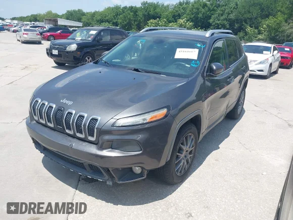 ✅ 2015 Jeep Cherokee Latitude • VIN: 1C4PJLCBXFW554078 • Lot: 45161667. Listed on IAAI with 167,073 mi. Free auction sales archive from the USA and detailed vehicle history report at DreamBid. Image 2.