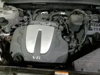 ✅ 2010 Hyundai Santa Fe Limited • VIN: 5NMSK4AG1AH333511 • Lot: 87469424. Listed on Copart with 121,492 mi. Free auction sales archive from the USA and detailed vehicle history report at DreamBid. Image 14.