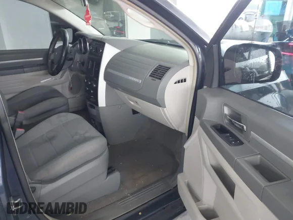 ✅ 2009 Dodge Grand Caravan SXT • VIN: 2D8HN54159R584470 • Лот: 44811374. Опубліковано раніше на IAAI з пробігом 184 661 миль. Безкоштовний доступ до архіву аукціонних продажів зі США та докладний звіт про історію автомобіля на DreamBid. Зображення 5.