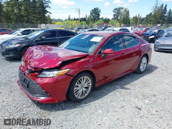 ✅ 2018 Toyota Camry LE • VIN: 4T1B11HK0JU506354 • Lot: 45145011. Wystawiony na IAAI z przebiegiem 73 219 mil. Bezpłatny archiwum sprzedaży aukcyjnych z USA i szczegółowy raport historii pojazdu na DreamBid. Zdjęcie 2.