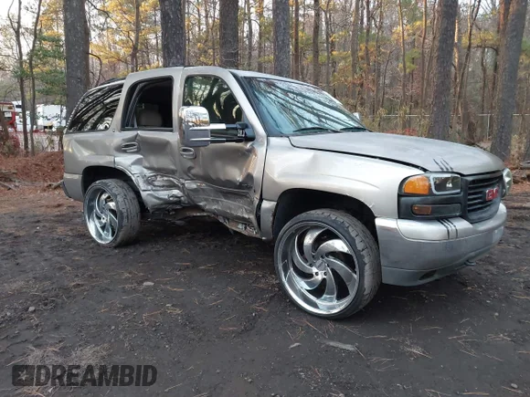 ✅ 2002 GMC Yukon SLT • VIN: 1GKEK13Z02J249030 • Lot: 43838064. Listed on IAAI with 404,922 mi. Free auction sales archive from the USA and detailed vehicle history report at DreamBid. Image 1.