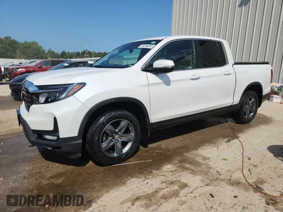 ✅ 2023 Honda Ridgeline RTL • VIN: 5FPYK3F58PB062525 • Лот: 69094055. Опубликован ранее на Copart с пробегом Не указан. Бесплатный доступ к архиву аукционных продаж из США и подробный отчёт об истории автомобиля на DreamBid. Изображение 1.