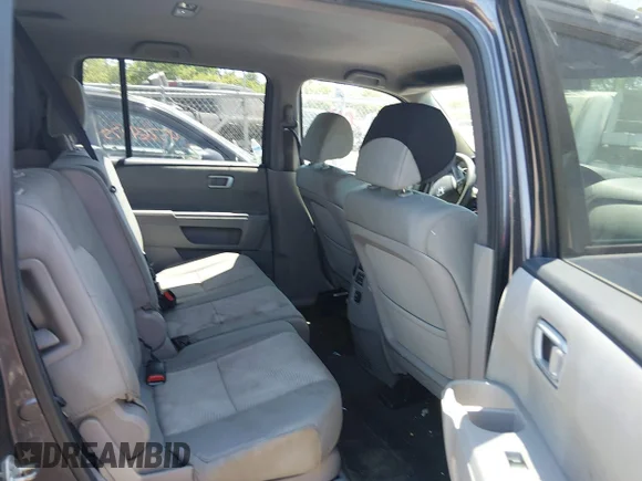 ✅ 2014 Honda Pilot LX • VIN: 5FNYF4H24EB025216 • Lot: 45270453. Listed on IAAI with 127,894 mi. Free auction sales archive from the USA and detailed vehicle history report at DreamBid. Image 8.