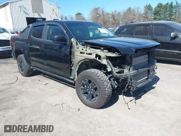 ✅ 2021 GMC Canyon 4WD AT4 • VIN: 1GTG6FEN4M1255075 • Лот: 42052978. Опубликован ранее на IAAI с пробегом 73 354 миль. Бесплатный доступ к архиву аукционных продаж из США и подробный отчёт об истории автомобиля на DreamBid. Изображение 1.