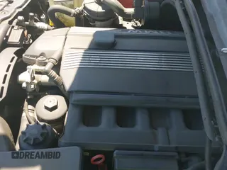 ✅ 2005 BMW 3 Series 325i • VIN: WBAET37435NJ90746 • Lot: 43014666. Listed on IAAI with 148,277 mi. Free auction sales archive from the USA and detailed vehicle history report at DreamBid. Image 14.