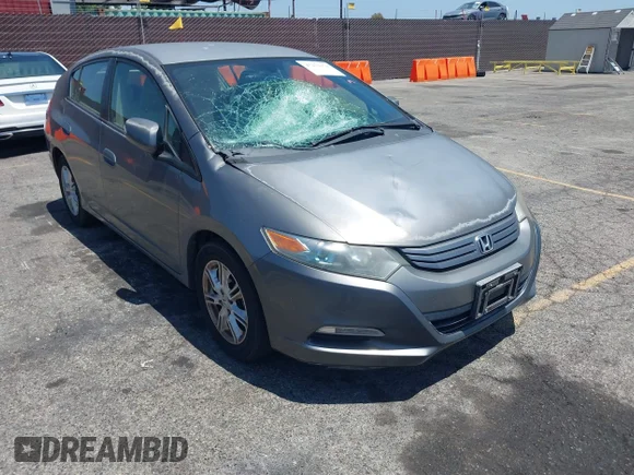 ✅ 2010 Honda Insight EX • VIN: JHMZE2H75AS028936 • Lot: 45273376. Listed on IAAI with 143,395 mi. Free auction sales archive from the USA and detailed vehicle history report at DreamBid. Image 1.