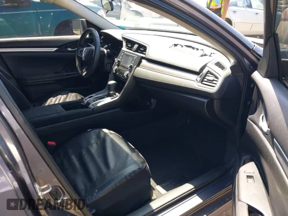 ✅ 2016 Honda Civic LX • VIN: 19XFC2F56GE006922 • Lot: 45301460. Wystawiony na IAAI z przebiegiem 124 518 mil. Bezpłatny archiwum sprzedaży aukcyjnych z USA i szczegółowy raport historii pojazdu na DreamBid. Zdjęcie 5.