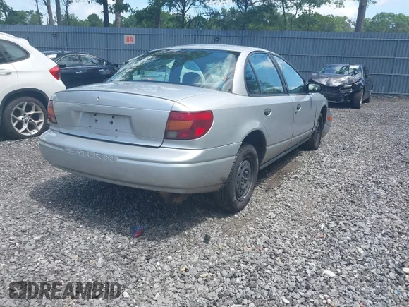 ✅ 2002 Saturn SL • VIN: 1G8ZH54802Z162216 • Лот: 42711526. Опубликован ранее на IAAI с пробегом 101 713 миль. Бесплатный доступ к архиву аукционных продаж из США и подробный отчёт об истории автомобиля на DreamBid. Изображение 4.