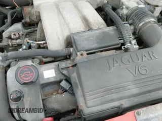 ✅ 2002 Jaguar X-Type • VIN: SAJEA51DX2XC56520 • Lot: 41820250. Listed on IAAI with 105,656 mi. Free auction sales archive from the USA and detailed vehicle history report at DreamBid. Image 12.