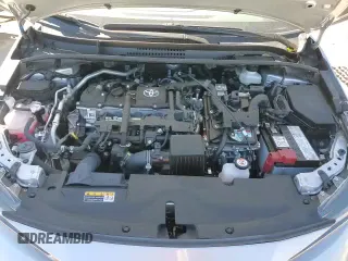 ✅ 2024 Toyota Corolla Hybrid LE • VIN: JTDBCMFEXR3061622 • Лот: 91015595. Опубликован ранее на Copart с пробегом 25 566 миль. Бесплатный доступ к архиву аукционных продаж из США и подробный отчёт об истории автомобиля на DreamBid. Изображение 13.