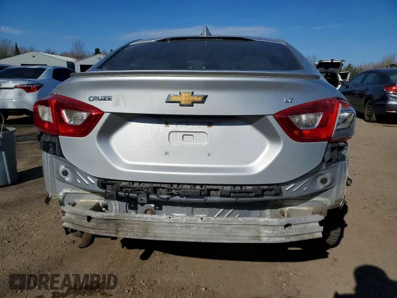 ✅ 2017 Chevrolet Cruze LT • VIN: 1G1BE5SM4H7216212 • Lot: 50958656. Listed on Copart with 176,414 mi. Free auction sales archive from the USA and detailed vehicle history report at DreamBid. Image 6.