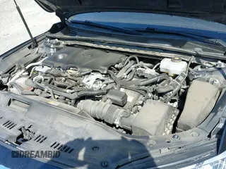 ✅ 2019 Toyota Avalon Limited Hybrid • VIN: 4T1B21FB3KU007257 • Lot: 43201581. Listed on IAAI with 144,721 mi. Free auction sales archive from the USA and detailed vehicle history report at DreamBid. Image 19.