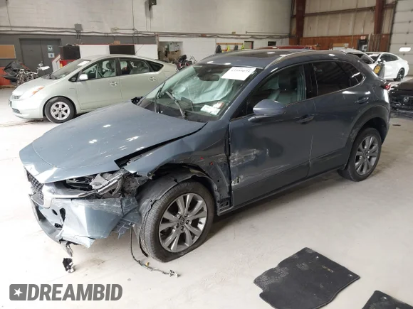 ✅ 2021 Mazda CX-30 Premium • VIN: 3MVDMBDM4MM217681 • Лот: 43559075. Опубліковано раніше на IAAI з пробігом 49 118 миль. Безкоштовний доступ до архіву аукціонних продажів зі США та докладний звіт про історію автомобіля на DreamBid. Зображення 2.