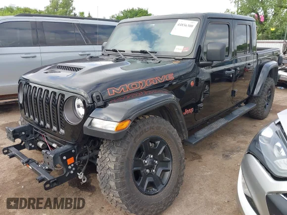 ✅ 2021 Jeep Gladiator Mojave • VIN: 1C6JJTEG1ML597633 • Lot: 44856300. Listed on IAAI with 41,829 mi. Free auction sales archive from the USA and detailed vehicle history report at DreamBid. Image 2.