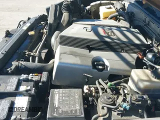 ✅ 1999 Lexus LX 470 • VIN: JT6HT00W5X0075986 • Lot: 41228035. Listed on IAAI with 163,548 mi. Free auction sales archive from the USA and detailed vehicle history report at DreamBid. Image 19.