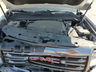 ✅ 2021 GMC Canyon 4WD AT4 • VIN: 1GTG6FEN0M1250813 • Лот: 84560945. Опубликован ранее на Copart с пробегом 46 643 миль. Бесплатный доступ к архиву аукционных продаж из США и подробный отчёт об истории автомобиля на DreamBid. Изображение 13.