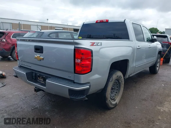 ✅ 2018 Chevrolet Silverado 1500 LT • VIN: 3GCUKREC9JG225887 • Lot: 45222300. Wystawiony na IAAI z przebiegiem 206 687 mil. Bezpłatny archiwum sprzedaży aukcyjnych z USA i szczegółowy raport historii pojazdu na DreamBid. Zdjęcie 4.