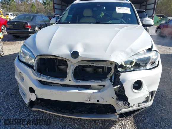 ✅ 2018 BMW X5 xDrive40e • VIN: 5UXKT0C5XJ0W01150 • Lot: 43918057. Listed on IAAI with 174,646 mi. Free auction sales archive from the USA and detailed vehicle history report at DreamBid. Image 6.