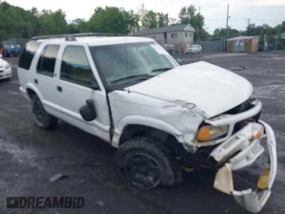 ✅ 1997 GMC Jimmy SLT • VIN: 1GKDT13WXV2569372 • Lot: 42667097. Listed on IAAI with 149,076 mi. Free auction sales archive from the USA and detailed vehicle history report at DreamBid. Image 1.