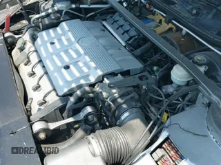 ✅ 1999 Cadillac DeVille DHS • VIN: 1G6KE54Y8XU777670 • Lot: 42821543. Listed on IAAI with 106,100 mi. Free auction sales archive from the USA and detailed vehicle history report at DreamBid. Image 12.