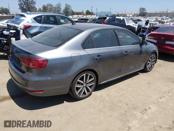 ✅ 2013 Volkswagen Jetta • VIN: 3VW4T7AJ3DM450640 • Lot: 45499309. Listed on IAAI with 157,311 mi. Free auction sales archive from the USA and detailed vehicle history report at DreamBid. Image 4.
