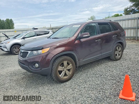 ✅ 2012 Kia Sorento EX • VIN: 5XYKUDA61CG256377 • Lot: 56310496. Listed on Copart with 147,776 mi. Free auction sales archive from the USA and detailed vehicle history report at DreamBid. Image 1.