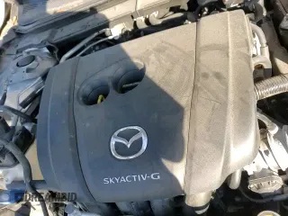 ✅ 2019 Mazda 3 Select • VIN: 3MZBPAAL5KM110266 • Лот: 90672195. Опубликован ранее на Copart с пробегом 26 621 миль. Бесплатный доступ к архиву аукционных продаж из США и подробный отчёт об истории автомобиля на DreamBid. Изображение 14.