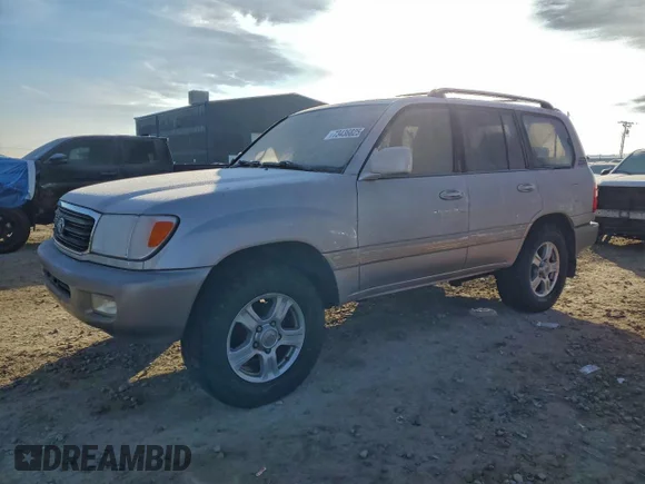 ✅ 2002 Toyota Land Cruiser • VIN: JTEHT05J622024480 • Lot: 73436825. Listed on Copart with 141,865 mi. Free auction sales archive from the USA and detailed vehicle history report at DreamBid. Image 1.