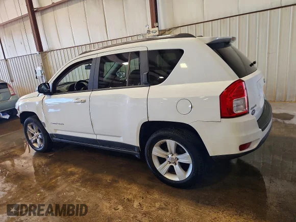 ✅ 2012 Jeep Compass Latitude • VIN: 1C4NJDEB9CD638197 • Lot: 55555886. Listed on Copart with 115,586 mi. Free auction sales archive from the USA and detailed vehicle history report at DreamBid. Image 2.