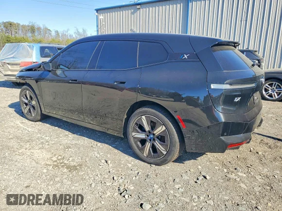 ✅ 2023 BMW iX xDrive50 • VIN: WB523CF0XPCM90881 • Лот: 79801245. Опубліковано раніше на Copart з пробігом 57 117 миль. Безкоштовний доступ до архіву аукціонних продажів зі США та докладний звіт про історію автомобіля на DreamBid. Зображення 2.