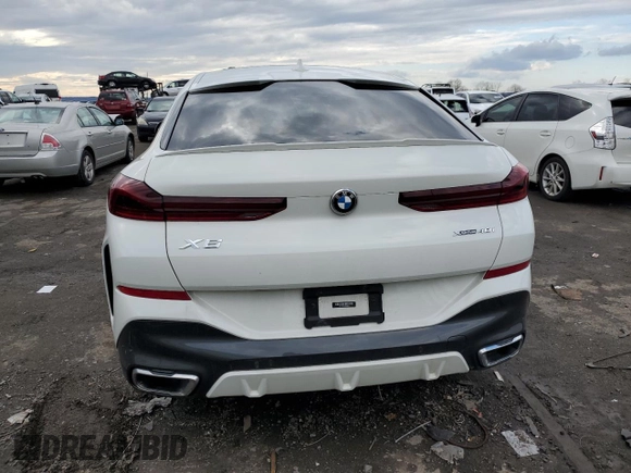 ✅ 2021 BMW X6 xDrive40i • VIN: 5UXCY6C02M9E69873 • Лот: 72771402. Опубліковано раніше на Copart з пробігом 24 218 миль. Безкоштовний доступ до архіву аукціонних продажів зі США та докладний звіт про історію автомобіля на DreamBid. Зображення 6.