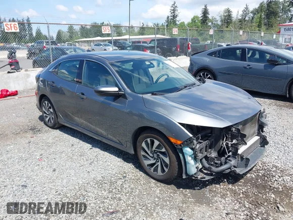 ✅ 2018 Honda Civic LX • VIN: SHHFK7H2XJU423074 • Lot: 45173473. Listed on IAAI with 148,636 mi. Free auction sales archive from the USA and detailed vehicle history report at DreamBid. Image 1.