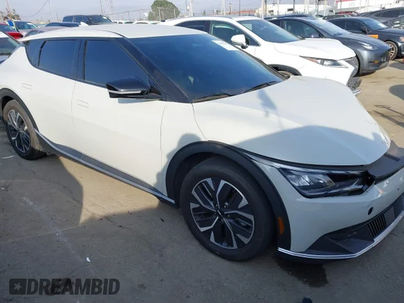 ✅ 2024 Kia EV6 Wind • VIN: KNDC3DLC9R5615468 • Лот: 41459807. Опубліковано раніше на IAAI з пробігом 22 159 миль. Безкоштовний доступ до архіву аукціонних продажів зі США та докладний звіт про історію автомобіля на DreamBid. Зображення 1.
