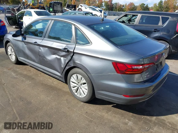 ✅ 2019 Volkswagen Jetta S • VIN: 3VWCB7BU0KM260931 • Lot: 43517419. Wystawiony na IAAI z przebiegiem 72 904 mil. Bezpłatny archiwum sprzedaży aukcyjnych z USA i szczegółowy raport historii pojazdu na DreamBid. Zdjęcie 3.