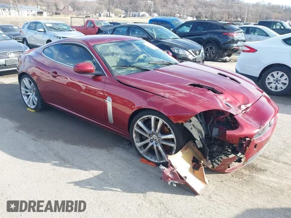 ✅ 2008 Jaguar XK XKR • VIN: SAJWA43C089B22700 • Lot: 41585734. Listed on IAAI with 67,946 mi. Free auction sales archive from the USA and detailed vehicle history report at DreamBid. Image 1.