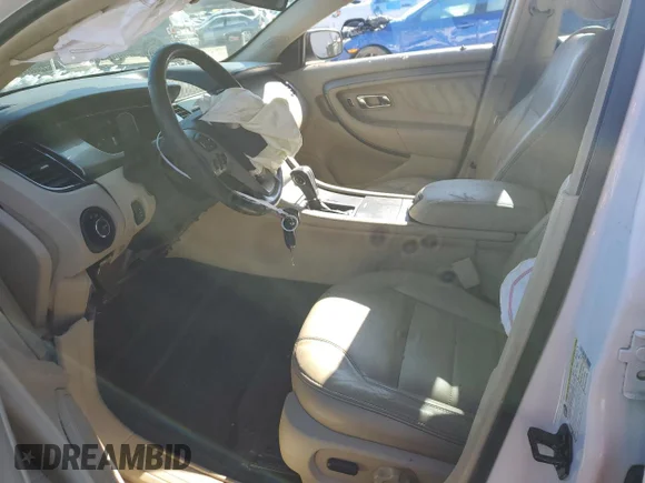 ✅ 2013 Ford Taurus SEL • VIN: 1FAHP2E87DG125718 • Lot: 84408624. Listed on Copart with Not provided. Free auction sales archive from the USA and detailed vehicle history report at DreamBid. Image 7.