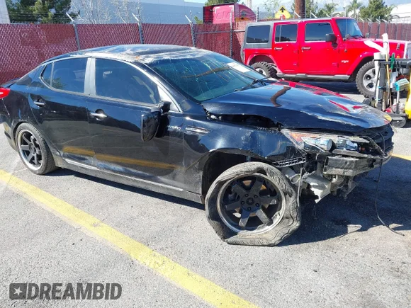 ✅ 2013 Kia Optima EX • VIN: KNAGM4AD5D5054069 • Lot: 44489239. Listed on IAAI with 111,072 mi. Free auction sales archive from the USA and detailed vehicle history report at DreamBid. Image 1.